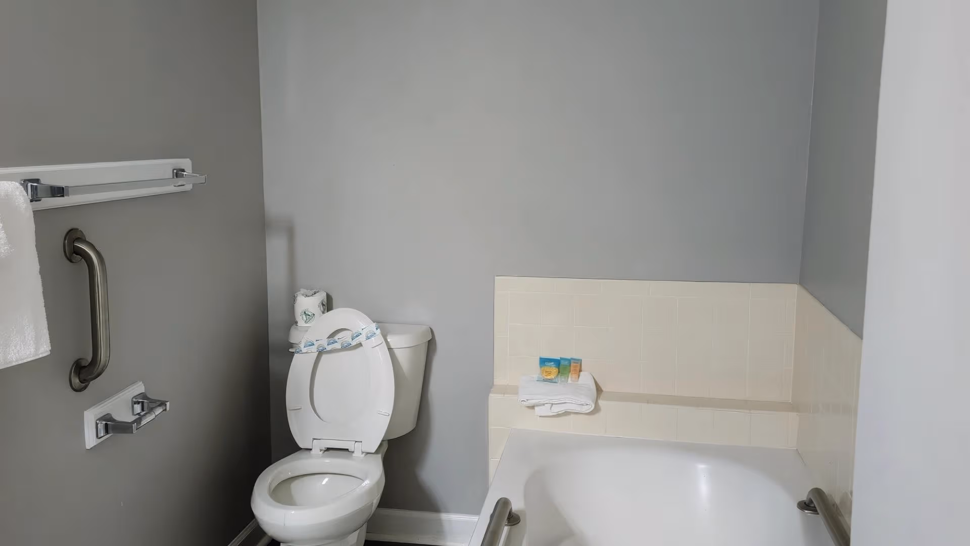 Resort bathroom with shower and granite countertop sink