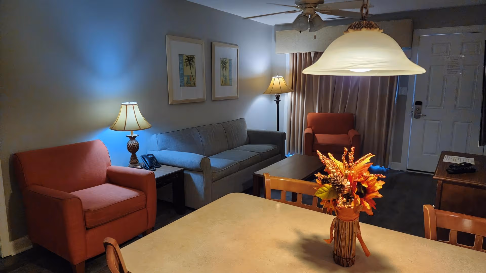 Living room with sofa, coffee table, and large TV